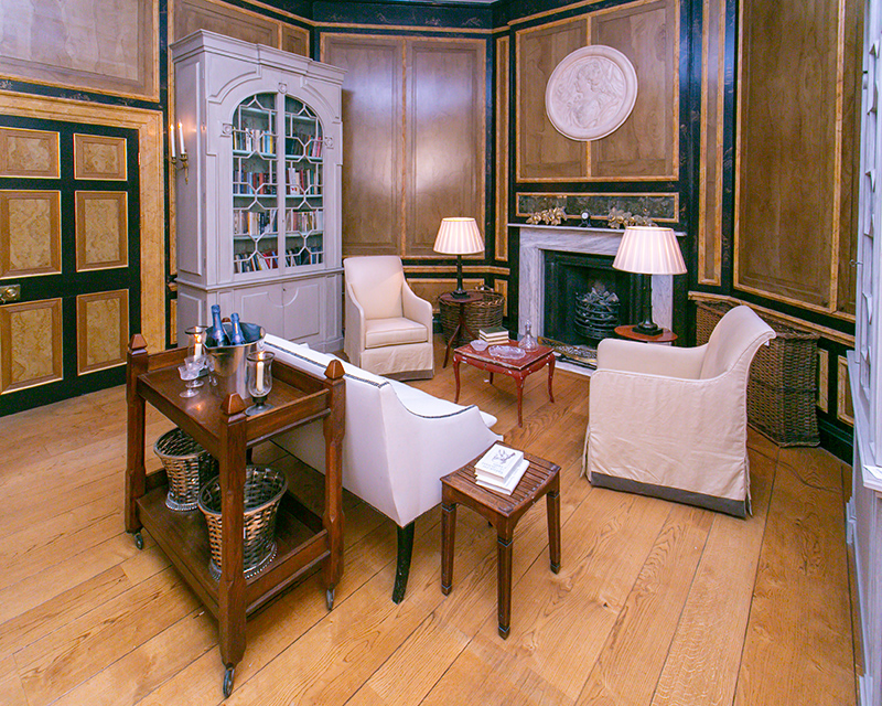 vintage solid wood and felt chair in home library